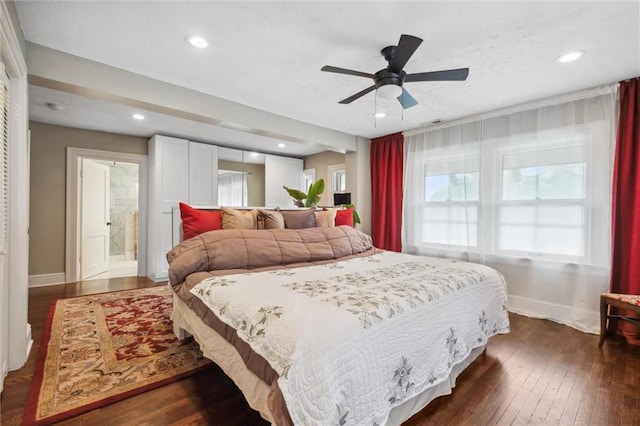 3804 Harrison St, Kansas City, MO 64109 - bedroom featuring dark wood-style flooring, baseboards, and recessed lighting
