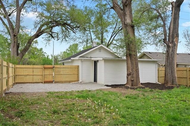 15015 E Truman Rd, Independence, MO 64050 - exterior space with a fenced backyard and a yard