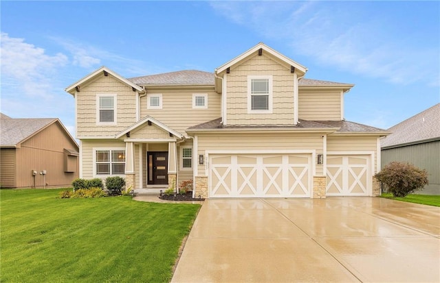 craftsman inspired home with concrete driveway, an attached garage, stone siding, and a front lawn