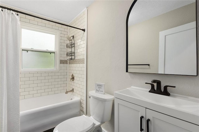 708 N River Blvd, Independence, MO 64050 - bathroom featuring vanity, a textured wall, toilet, a textured ceiling, and shower / bath combo