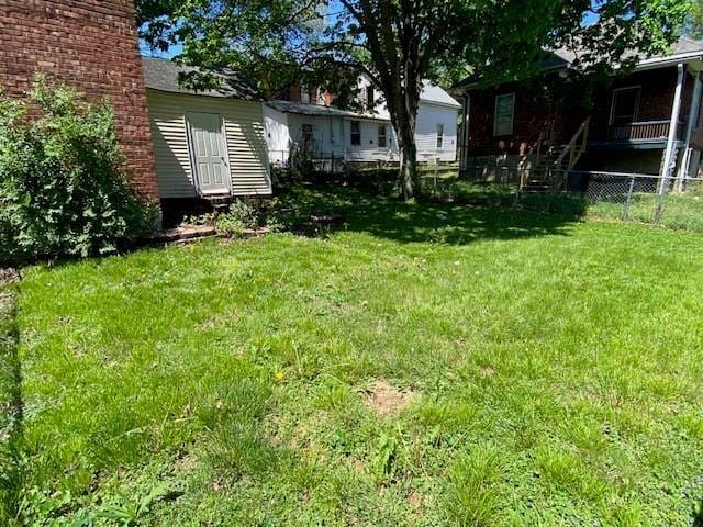 view of yard with fence