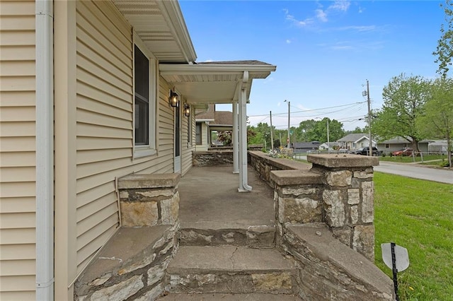 4433 N Jackson Ave, Kansas City, MO 64117 - view of home's exterior featuring a porch