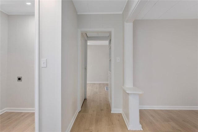 4433 N Jackson Ave, Kansas City, MO 64117 - hall with crown molding, baseboards, and light wood finished floors