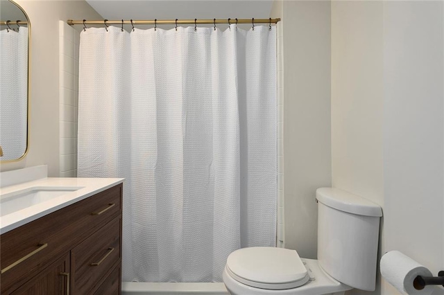 4433 N Jackson Ave, Kansas City, MO 64117 - bathroom with vanity, toilet, and a shower with curtain
