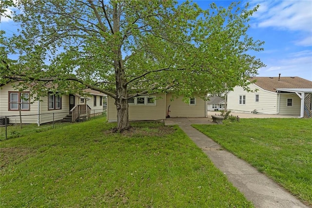 4433 N Jackson Ave, Kansas City, MO 64117 - view of yard featuring a patio and fence