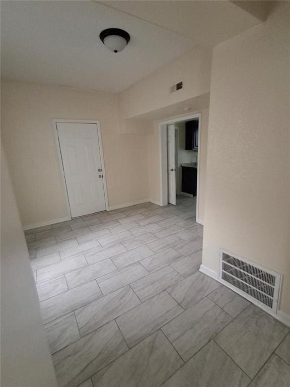 104 S 13th St, Kansas City, KS 66102 - spare room with baseboards