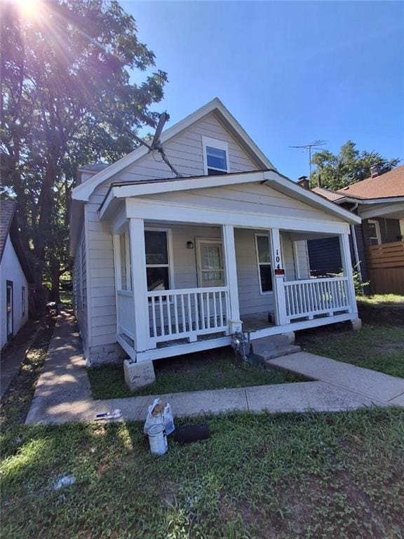 104 S 13th St, Kansas City, KS 66102 - view of front of property featuring a porch