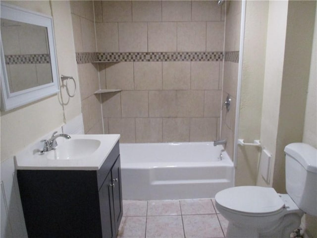 104 S 13th St, Kansas City, KS 66102 - bathroom featuring vanity, tub / shower combination, and tile patterned flooring