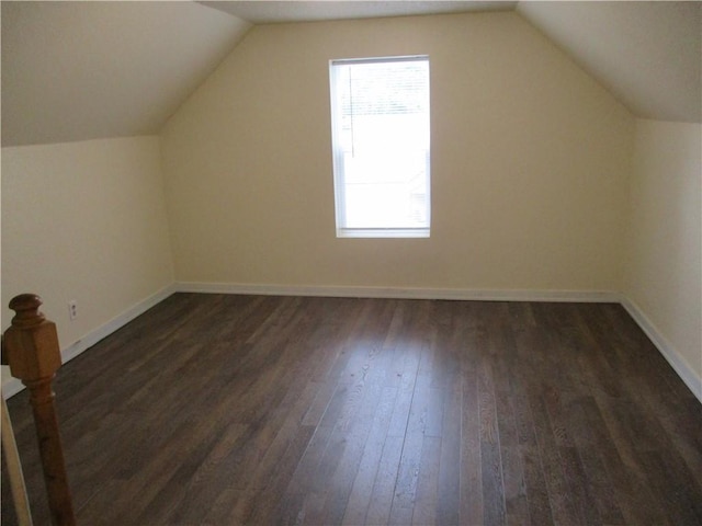 104 S 13th St, Kansas City, KS 66102 - bonus room featuring dark wood finished floors and vaulted ceiling