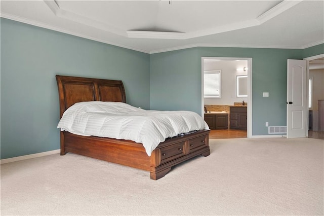 bedroom with visible vents, a raised ceiling, carpet floors, and baseboards