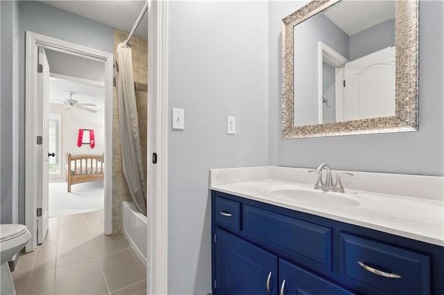 bathroom with tile patterned flooring, shower / tub combo with curtain, toilet, and vanity