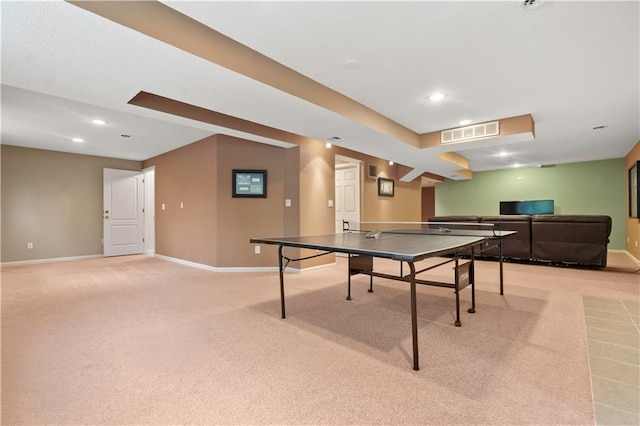 rec room with recessed lighting, baseboards, light colored carpet, and visible vents