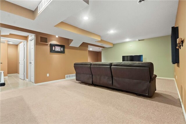 living area featuring baseboards, light colored carpet, recessed lighting, and visible vents