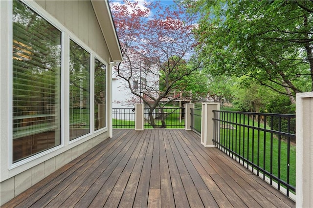 deck featuring a yard
