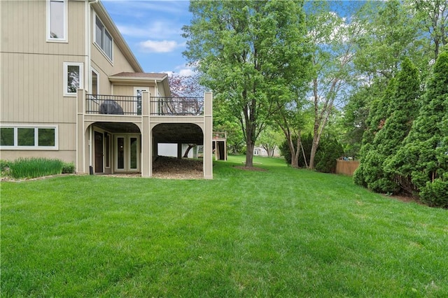 view of yard featuring a wooden deck