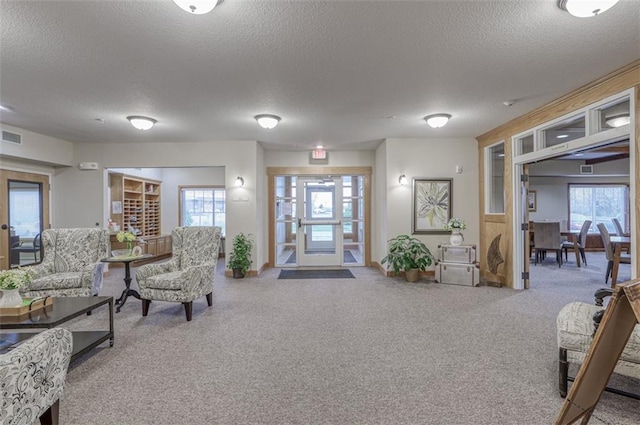 building lobby featuring visible vents