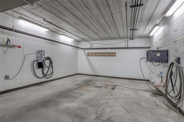 garage featuring baseboards