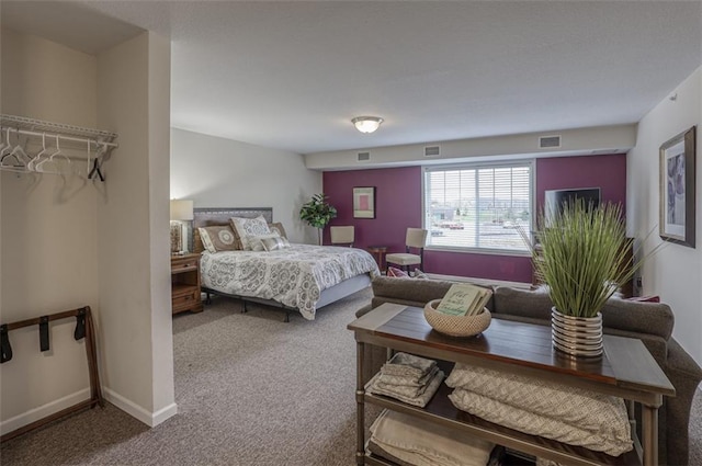 carpeted bedroom with visible vents