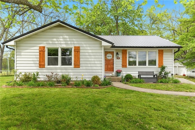 751 S State Route J Hwy, Peculiar, MO 64078 - view of front facade featuring a front lawn and metal roof