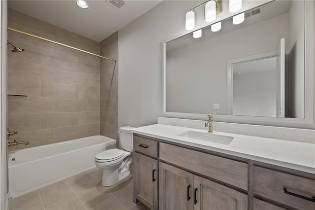 bathroom with toilet, visible vents, bathing tub / shower combination, and vanity