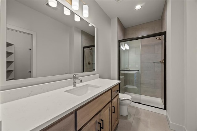 bathroom with toilet, recessed lighting, a shower stall, and vanity