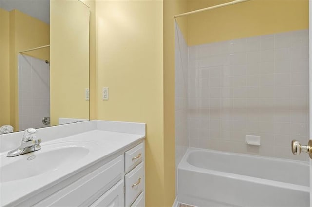 bathroom with bathing tub / shower combination and vanity