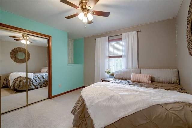 bedroom featuring a closet, a ceiling fan, carpet, and baseboards