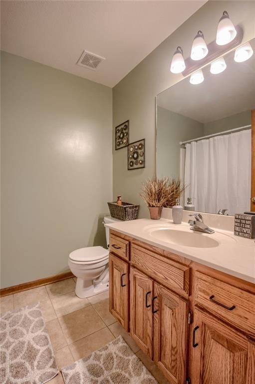 full bathroom with visible vents, tile patterned flooring, vanity, toilet, and a shower with shower curtain