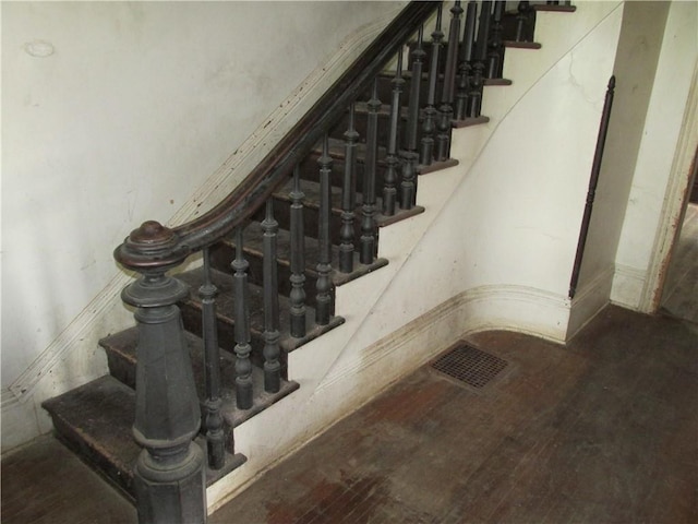 820 Custer St, Trenton, MO 64683 - stairway with visible vents and hardwood / wood-style flooring