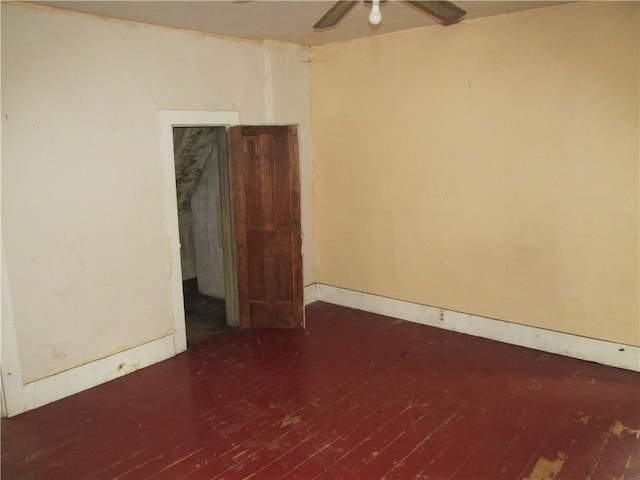 820 Custer St, Trenton, MO 64683 - empty room featuring ceiling fan, baseboards, and hardwood / wood-style floors