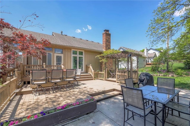 view of patio with outdoor dining area and fence