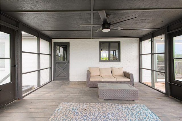 1204 E 223rd St, Cleveland, MO 64734 - sunroom featuring ceiling fan and an outdoor hangout area