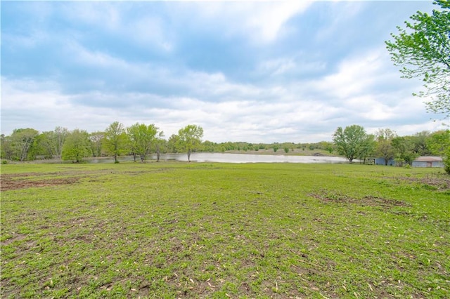 1204 E 223rd St, Cleveland, MO 64734 - view of yard with a water view