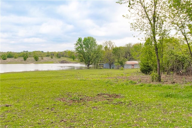 1204 E 223rd St, Cleveland, MO 64734 - view of yard featuring a water view