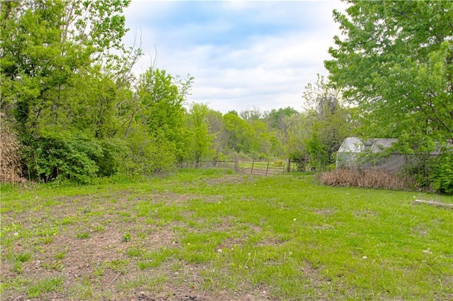 1204 E 223rd St, Cleveland, MO 64734 - view of yard featuring fence