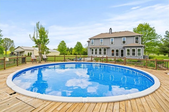 14305 S Gammon Rd, Greenwood, MO 64034 - view of swimming pool featuring a wooden deck