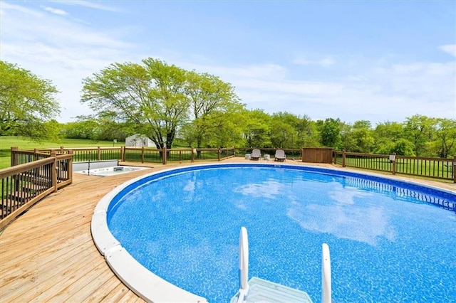 14305 S Gammon Rd, Greenwood, MO 64034 - view of pool with a wooden deck