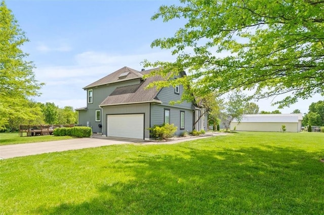 14305 S Gammon Rd, Greenwood, MO 64034 - view of front facade with concrete driveway, a front yard, and a shingled roof