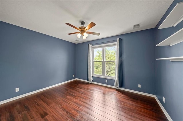 14305 S Gammon Rd, Greenwood, MO 64034 - spare room with ceiling fan and hardwood / wood-style flooring