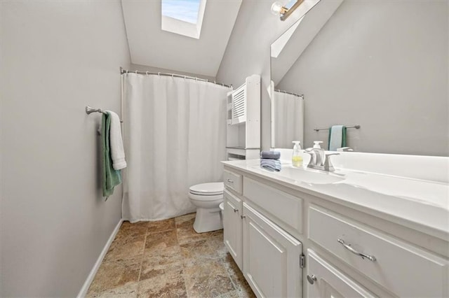 14305 S Gammon Rd, Greenwood, MO 64034 - full bathroom featuring a skylight, vanity, stone finish floors, vaulted ceiling, and a shower with curtain
