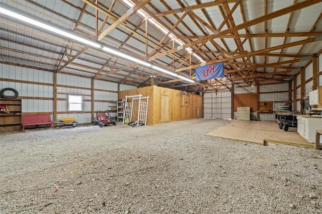 14305 S Gammon Rd, Greenwood, MO 64034 - garage featuring metal wall