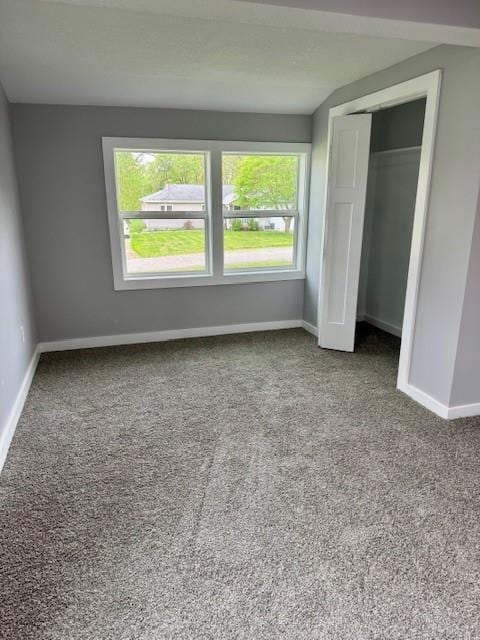 403 W Cedar St, Waverly, MO 64096 - unfurnished bedroom featuring carpet flooring, baseboards, and a closet