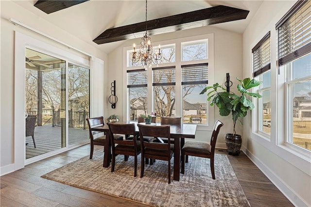 dining area featuring vaulted ceiling with beams, a chandelier, a healthy amount of sunlight, and hardwood / wood-style flooring