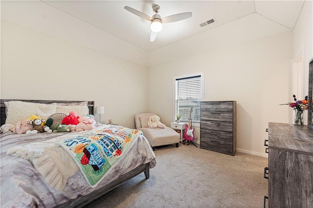 bedroom featuring light carpet, a ceiling fan, baseboards, vaulted ceiling, and visible vents