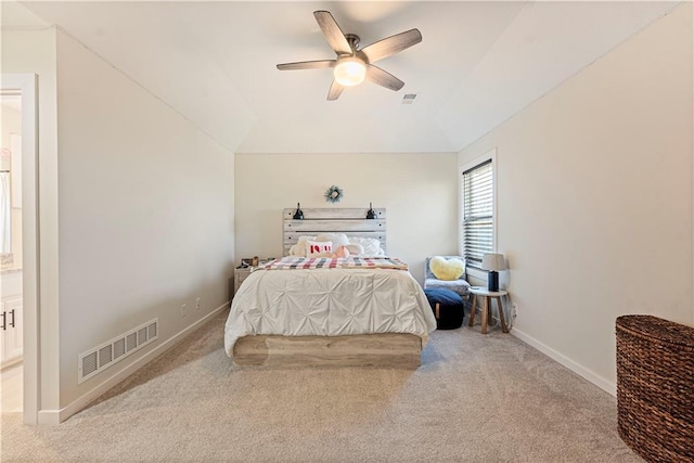 carpeted bedroom with ceiling fan, visible vents, and baseboards