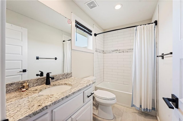 full bathroom featuring vanity, toilet, shower / bath combo with shower curtain, recessed lighting, and visible vents