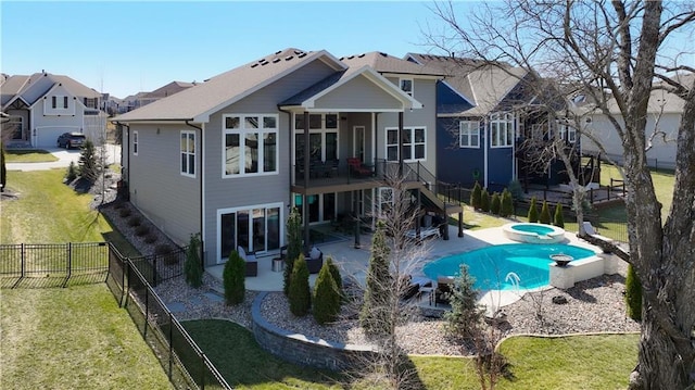 back of house featuring a lawn, a patio, stairway, and a fenced backyard