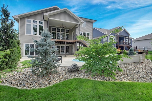 11212 W 170th Pl, Overland Park, KS 66221 - rear view of house featuring ceiling fan, a balcony, a patio, and stairway