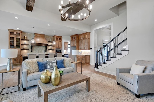 11212 W 170th Pl, Overland Park, KS 66221 - living area with baseboards, recessed lighting, stairs, a chandelier, and light wood-style flooring