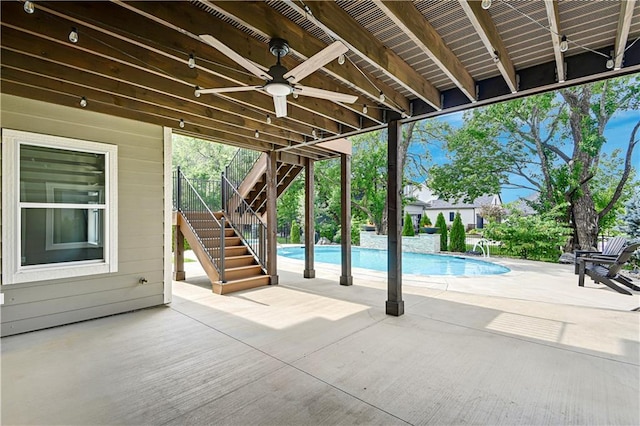 11212 W 170th Pl, Overland Park, KS 66221 - view of patio featuring stairway, ceiling fan, and an outdoor pool